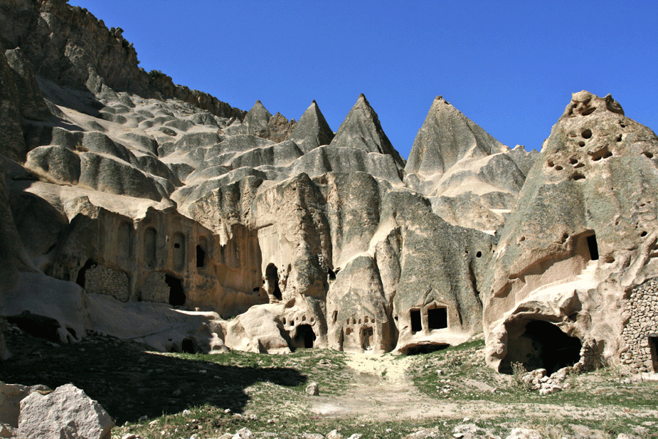 Cave homes carved into the mountainside.