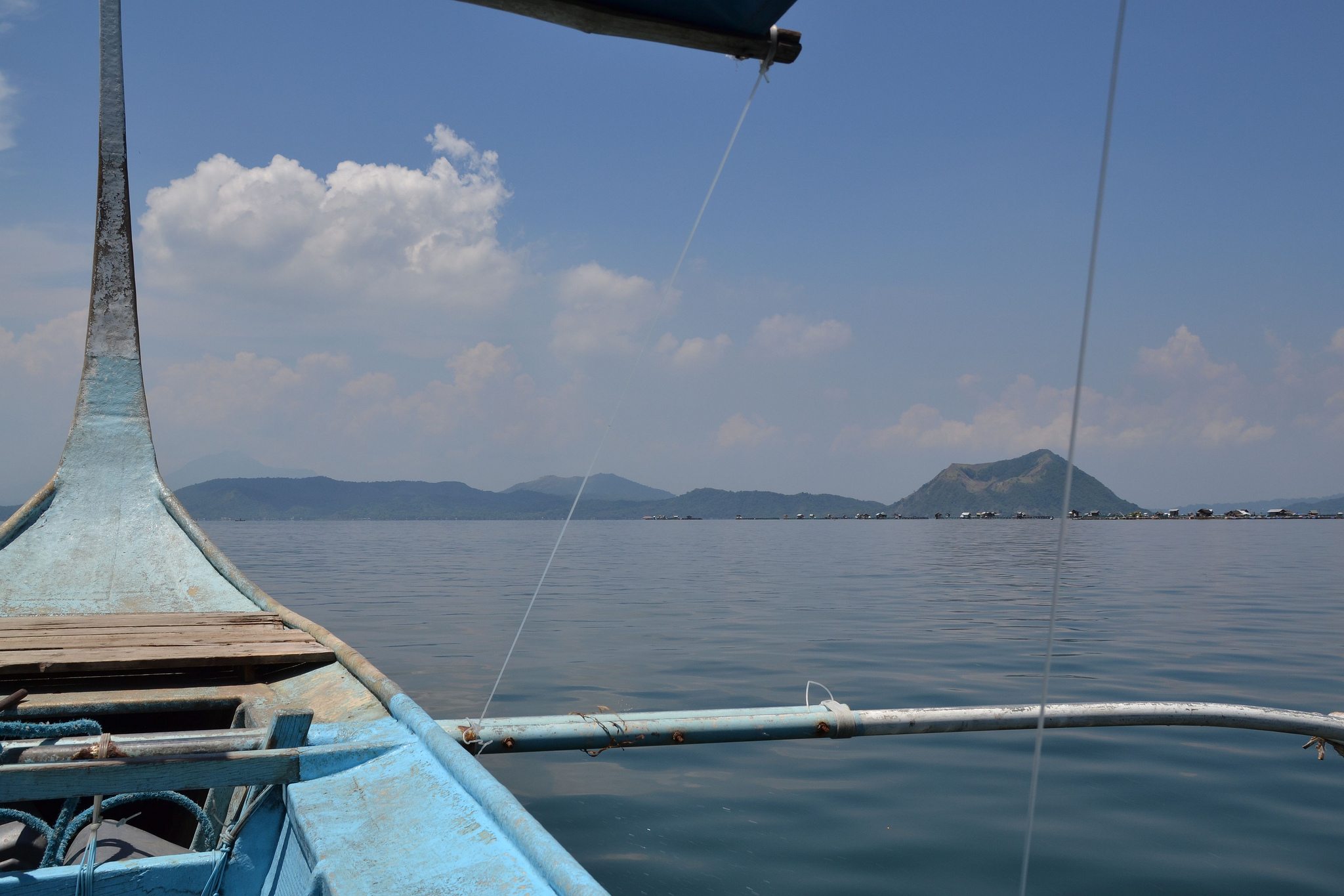 Filipino boat with volcano island in the distance (photo: Shankar S)