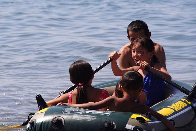 Kids in boat at Issyk Kul