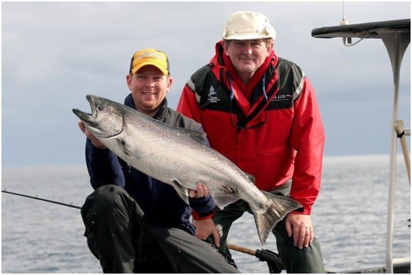 The author and his dad size up the catch of the day.