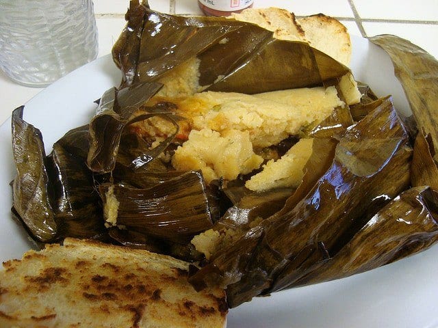 Nacatamal: the Nicaraguan answer to tamales, popular all over the country. Made out of mashed corn and lard, stuffed with either chicken/pork seasoned with tomatoes, onions, garlic (photo: H.C.)