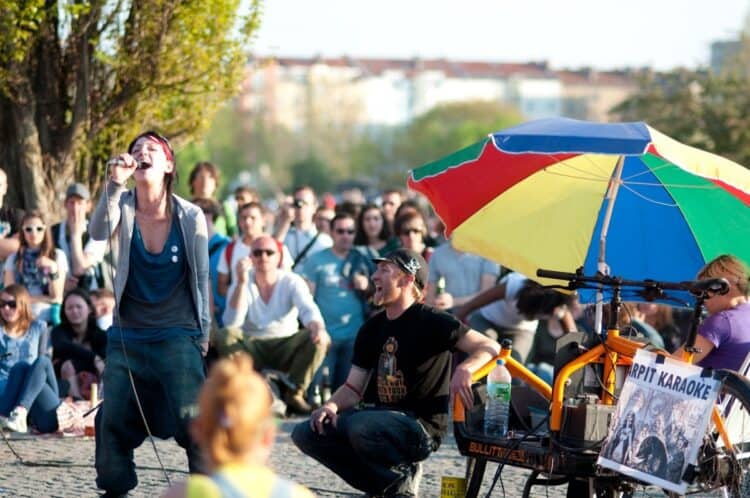 Bearpit Karaoke Singin' like she means it at Bearpit Karaoke. Image source.