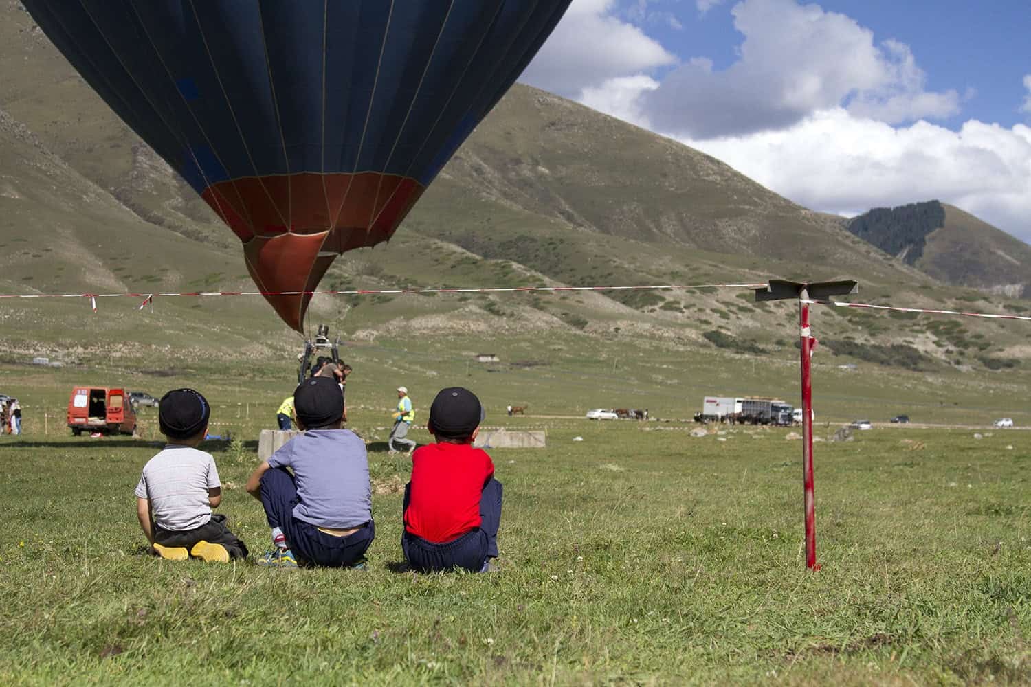 Boys watching the balloon