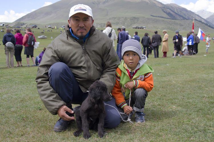Local family Murat, his son and the beautiful little Taigan puppy.