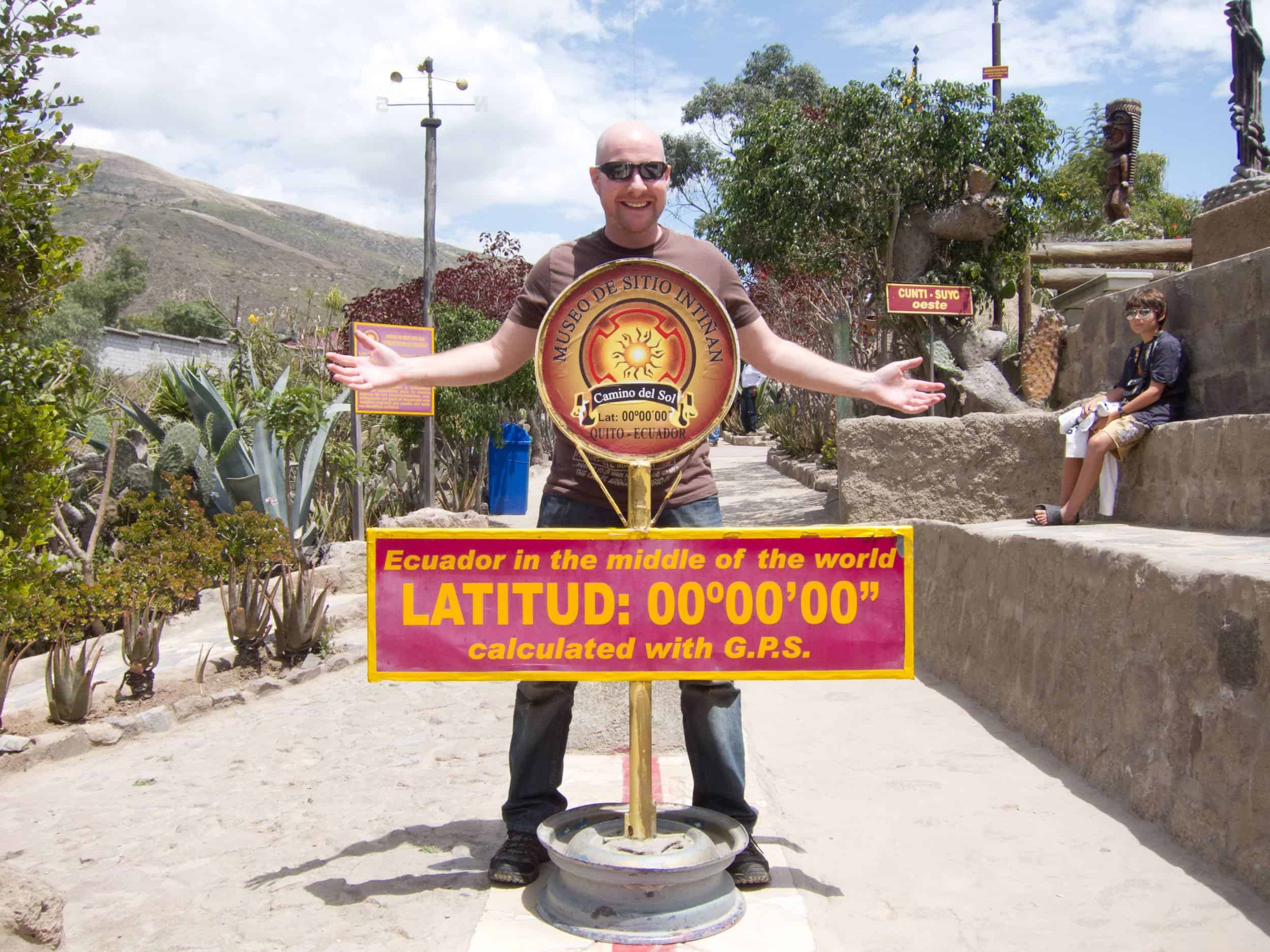 The author at the true Equator, one of the top 10 things to do in Ecuador