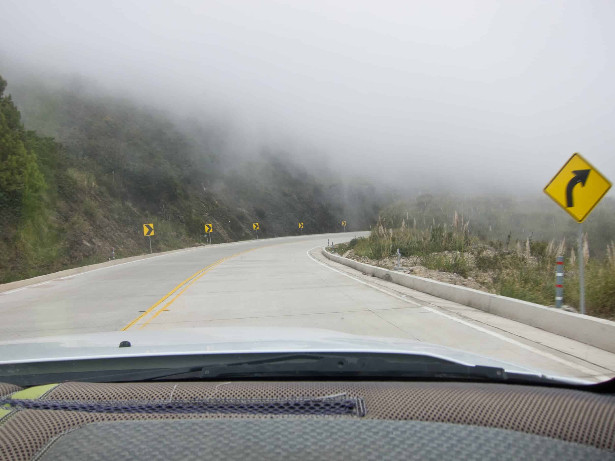 Navigating cloud-covered roads outside Cuenca, Ecuador