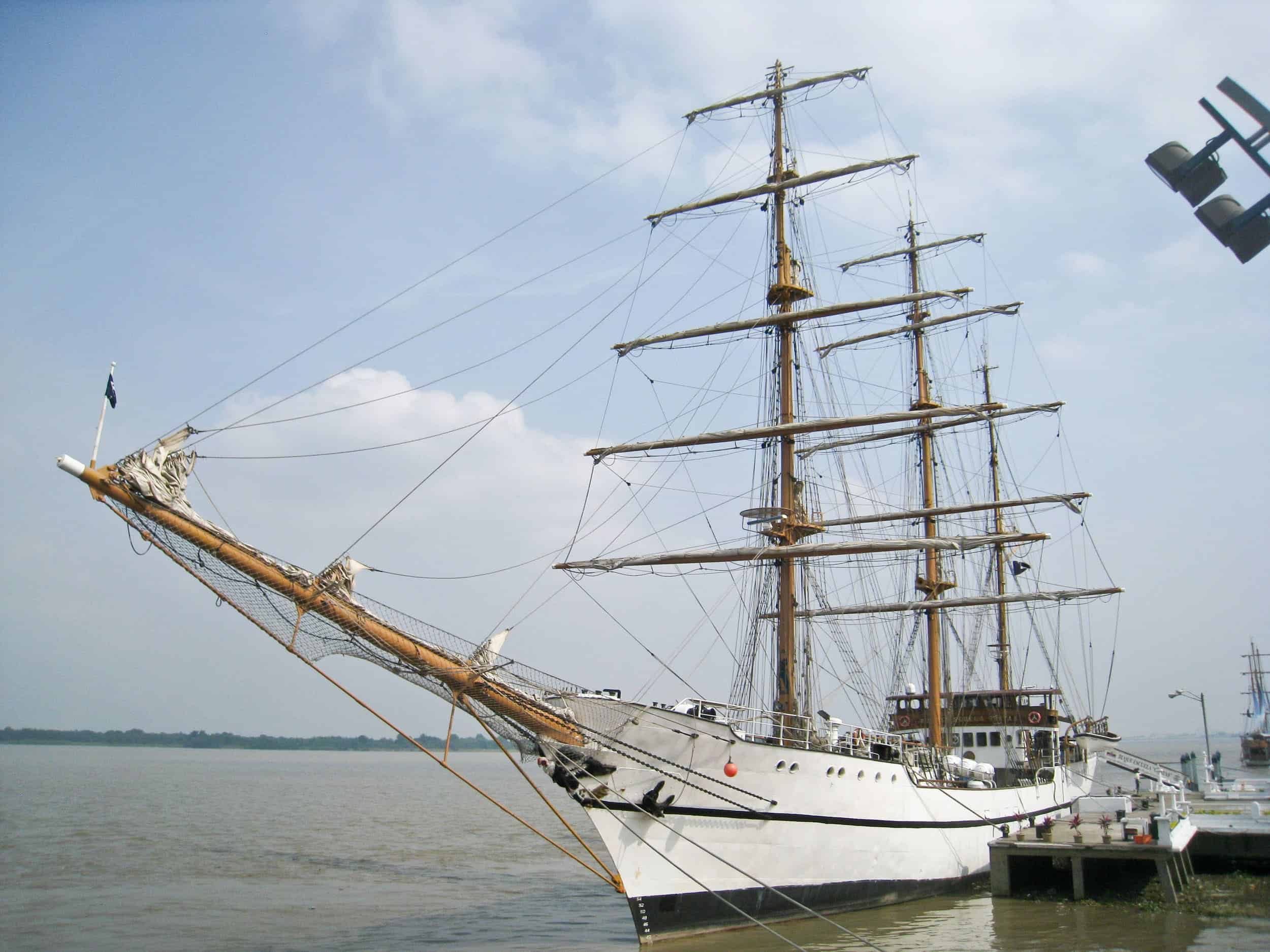 A working sailboat tied up along the Malecon