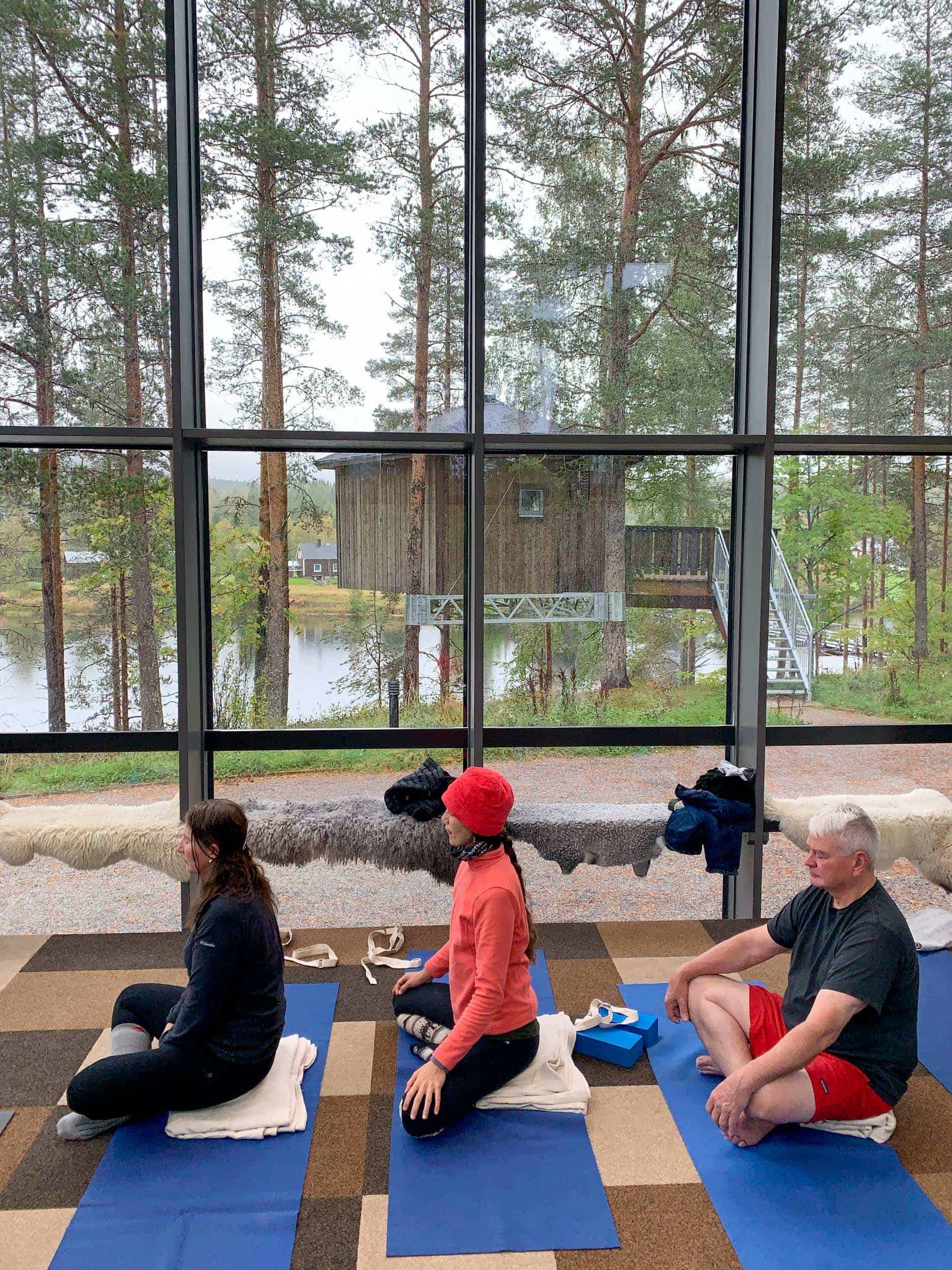 Yoga in the glass house at Granö Beckasin