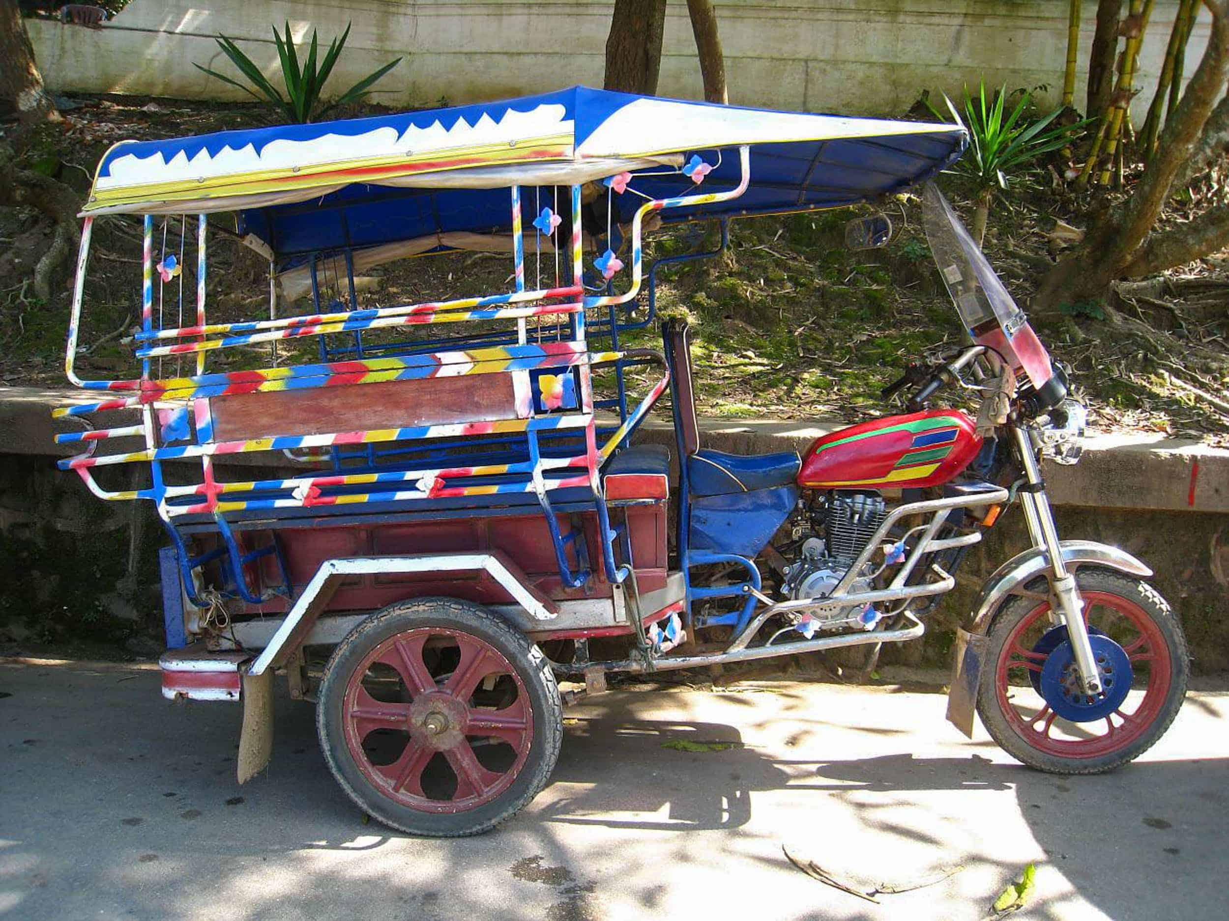 A motorcycle tuk-tuk known as a 