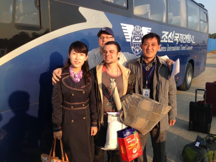 Tourist with North Korean tour guides