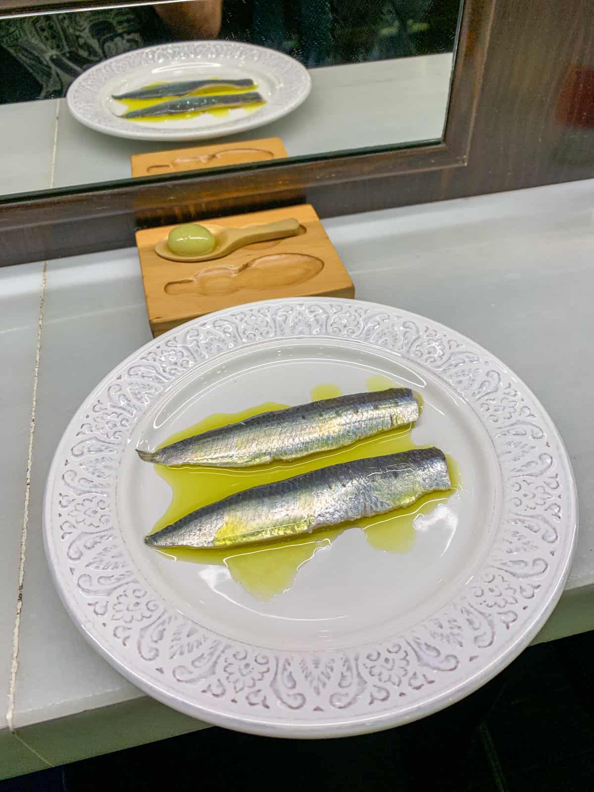 Sardines with olive oil at Bodega 1900 in Barcelona, Spain