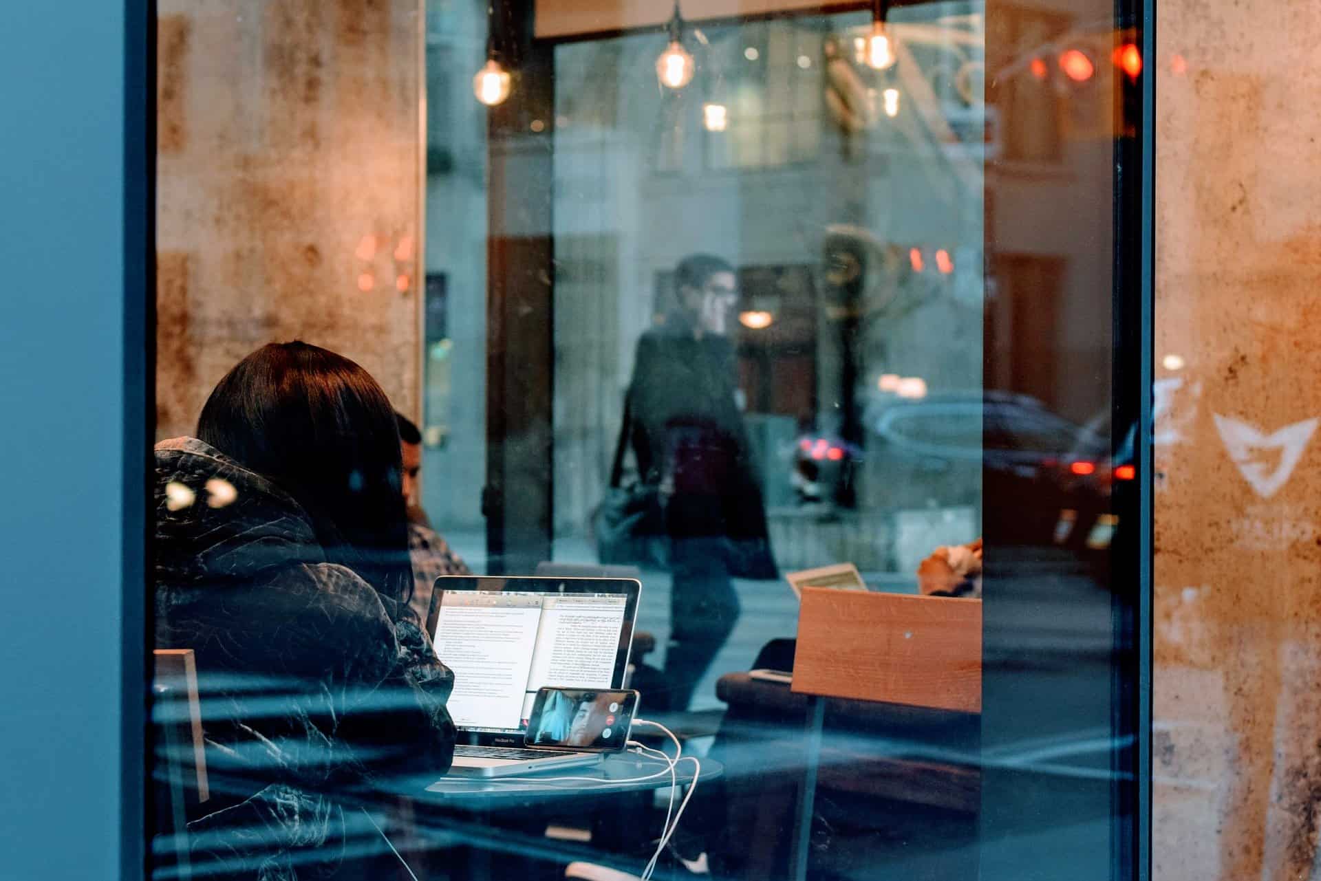 Laptop user in a cafe