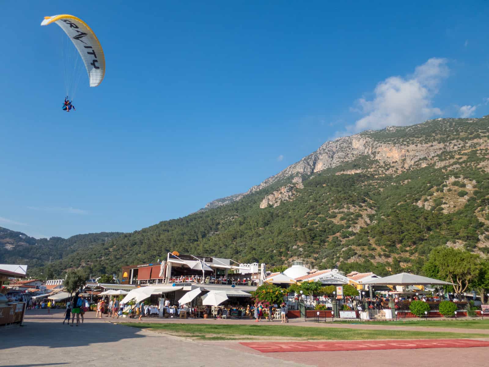 Paraglider preparing to land in Oludeniz