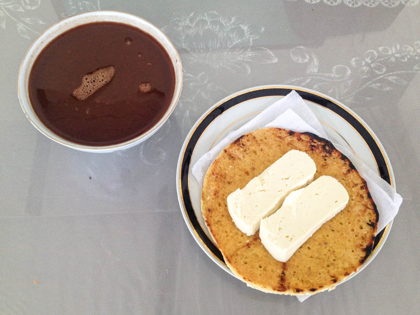 Arepa with cheese and hot chocolate