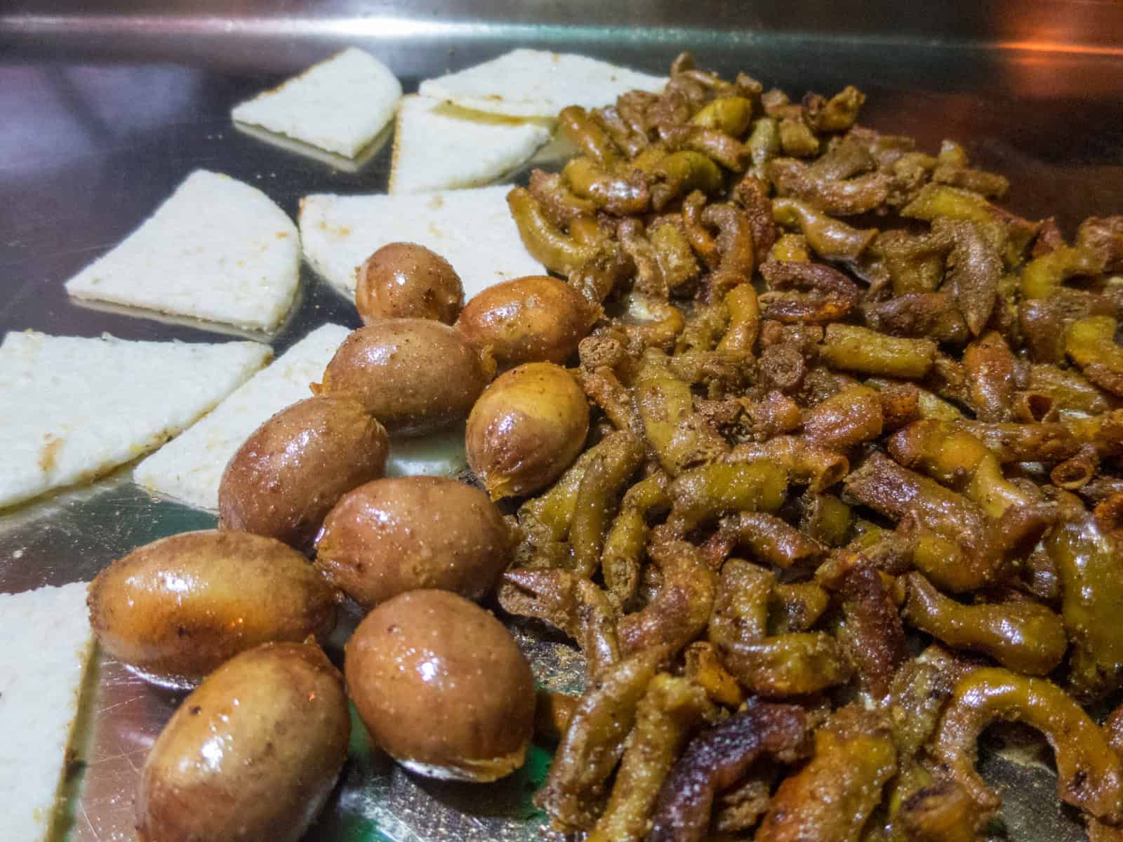 From left: arepas, sausage, and chunchullo