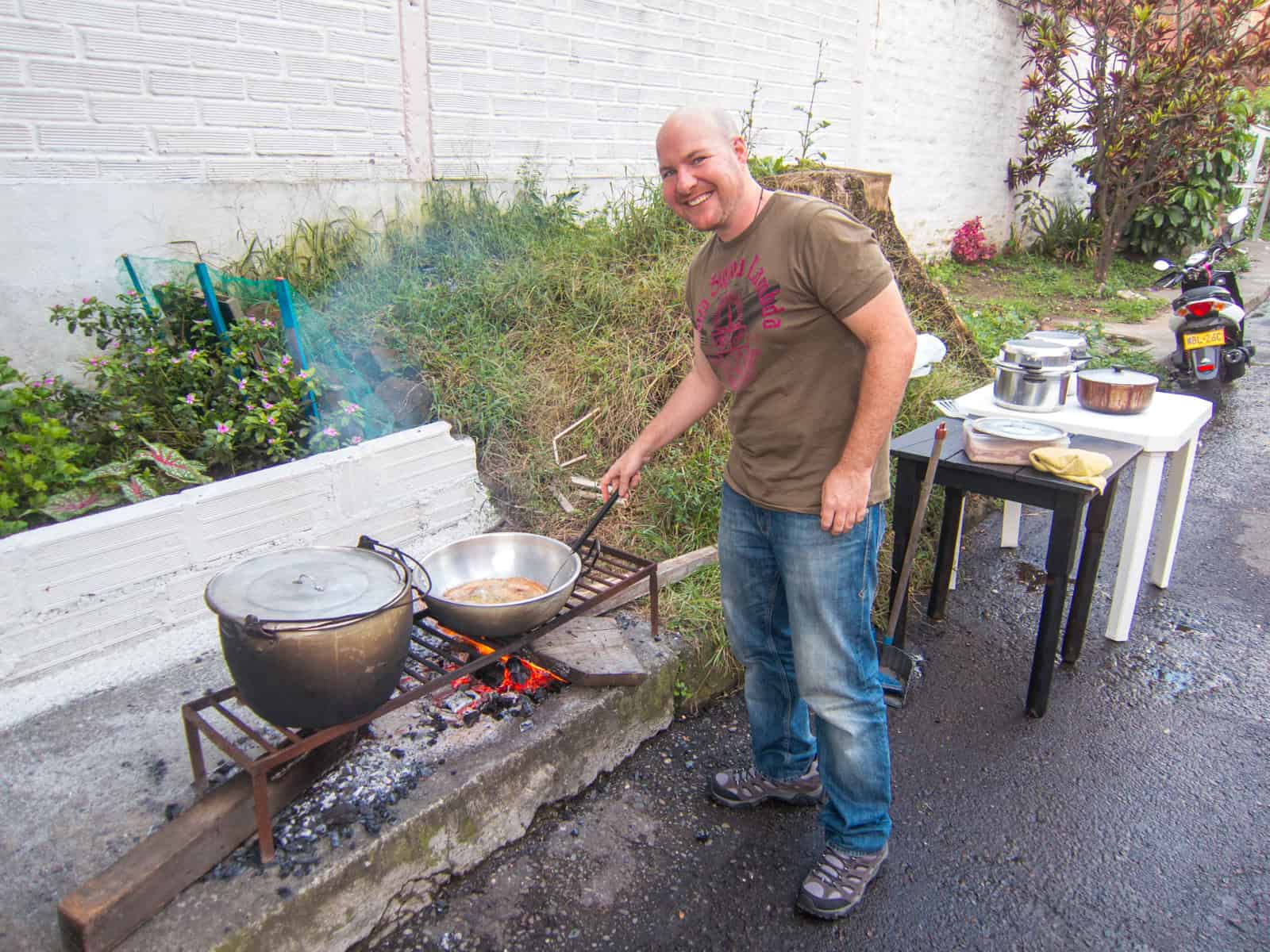 Dave cooking on the street in Medellin