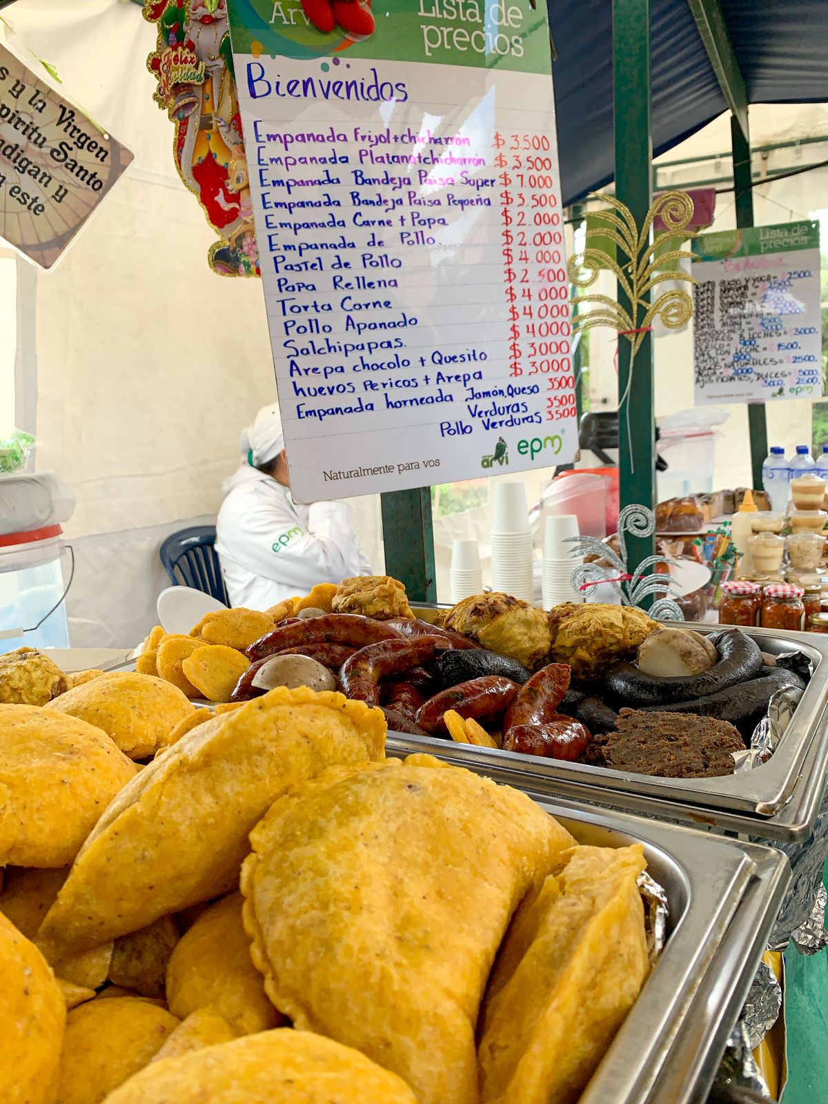 Giant empanadas, a ubiquitous Colombian food, at a farmer's market in Parque Arvi, Antioquia