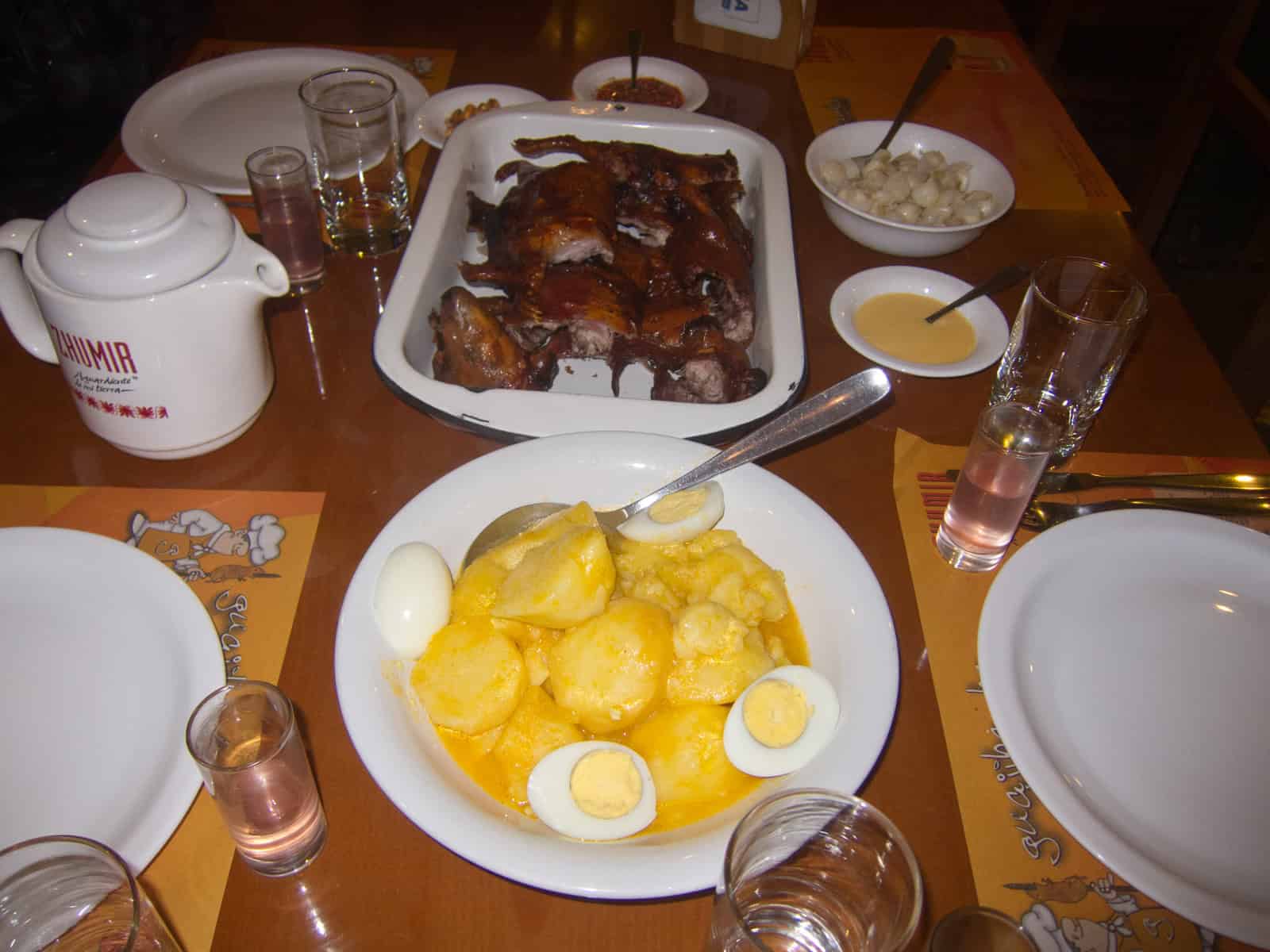 Cuy and potatoes at Guajibamba Cuyes in Cuenca, Ecuador.