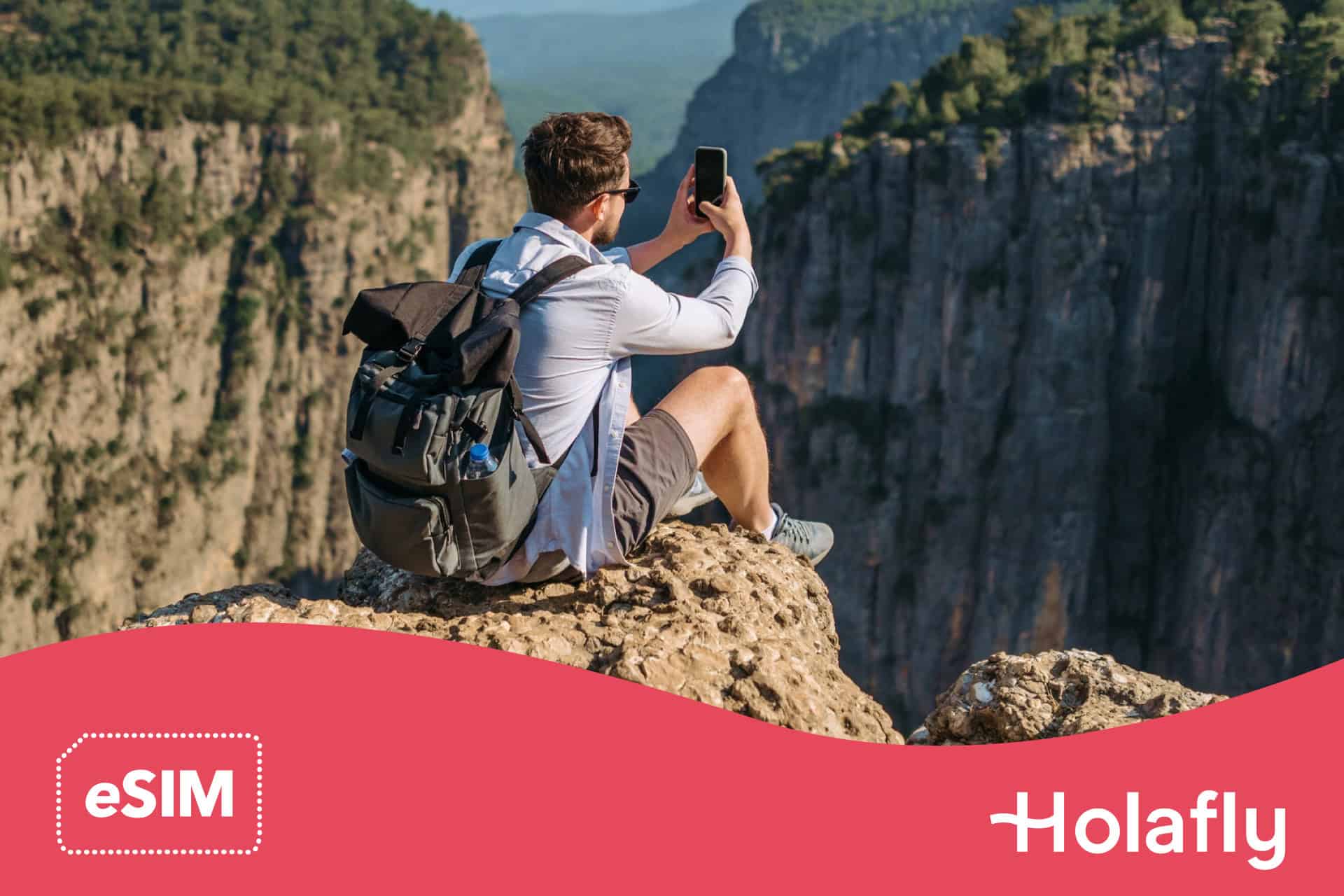 Backpacker with eSIm and mobile phone.