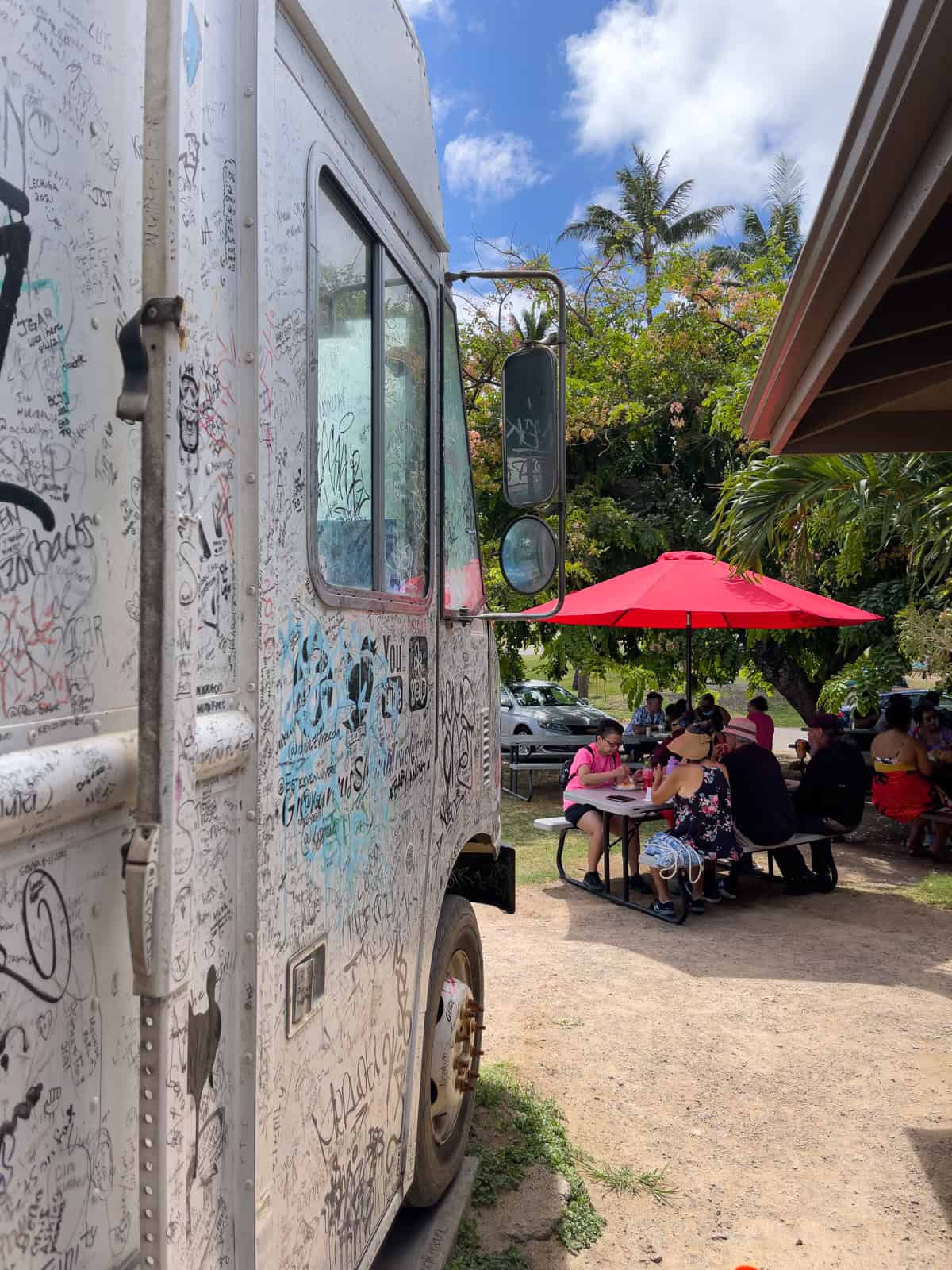 Giovanni's shrimp truck attracts vacationers out for an Oahu scenic drive.