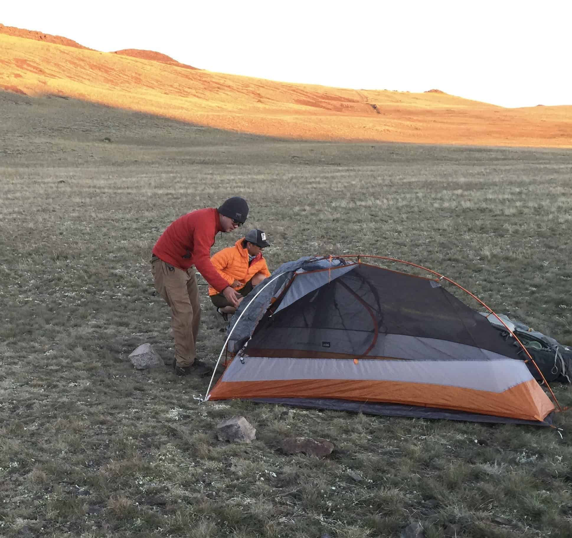 Group member Calvin sets up his tent at 11,680 feet (3,560 meters)