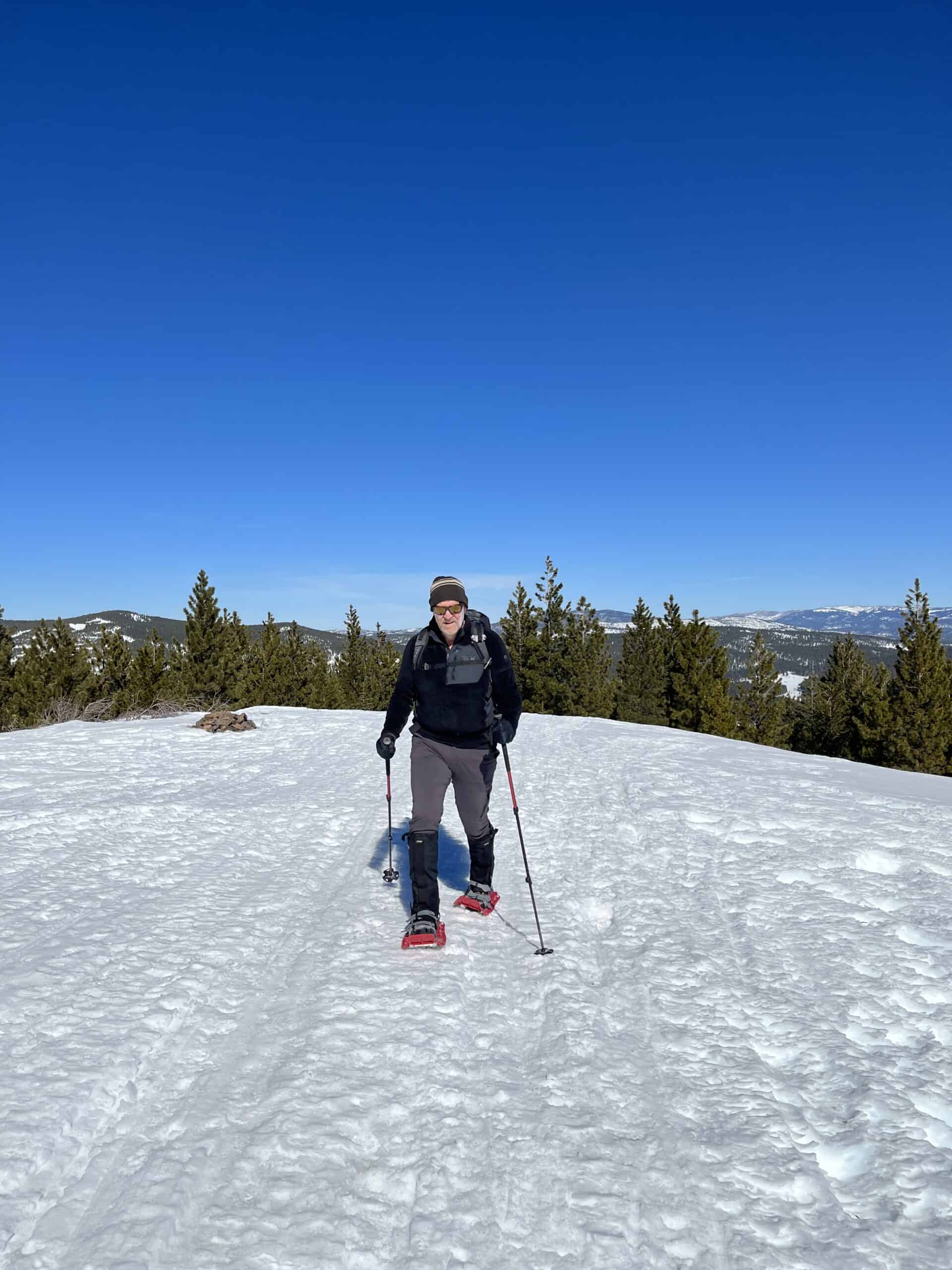 The author summiting Prosser Hill on snowshoes