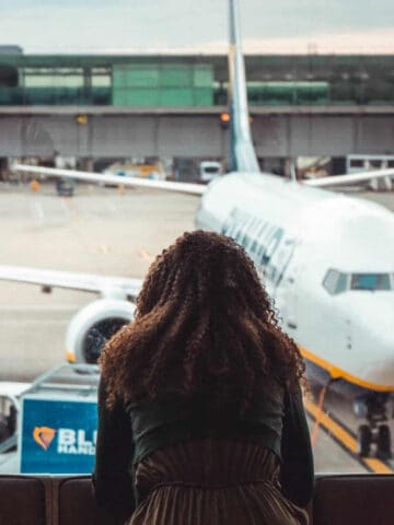 Woman in an airport (photo: Arthur Edelmans).