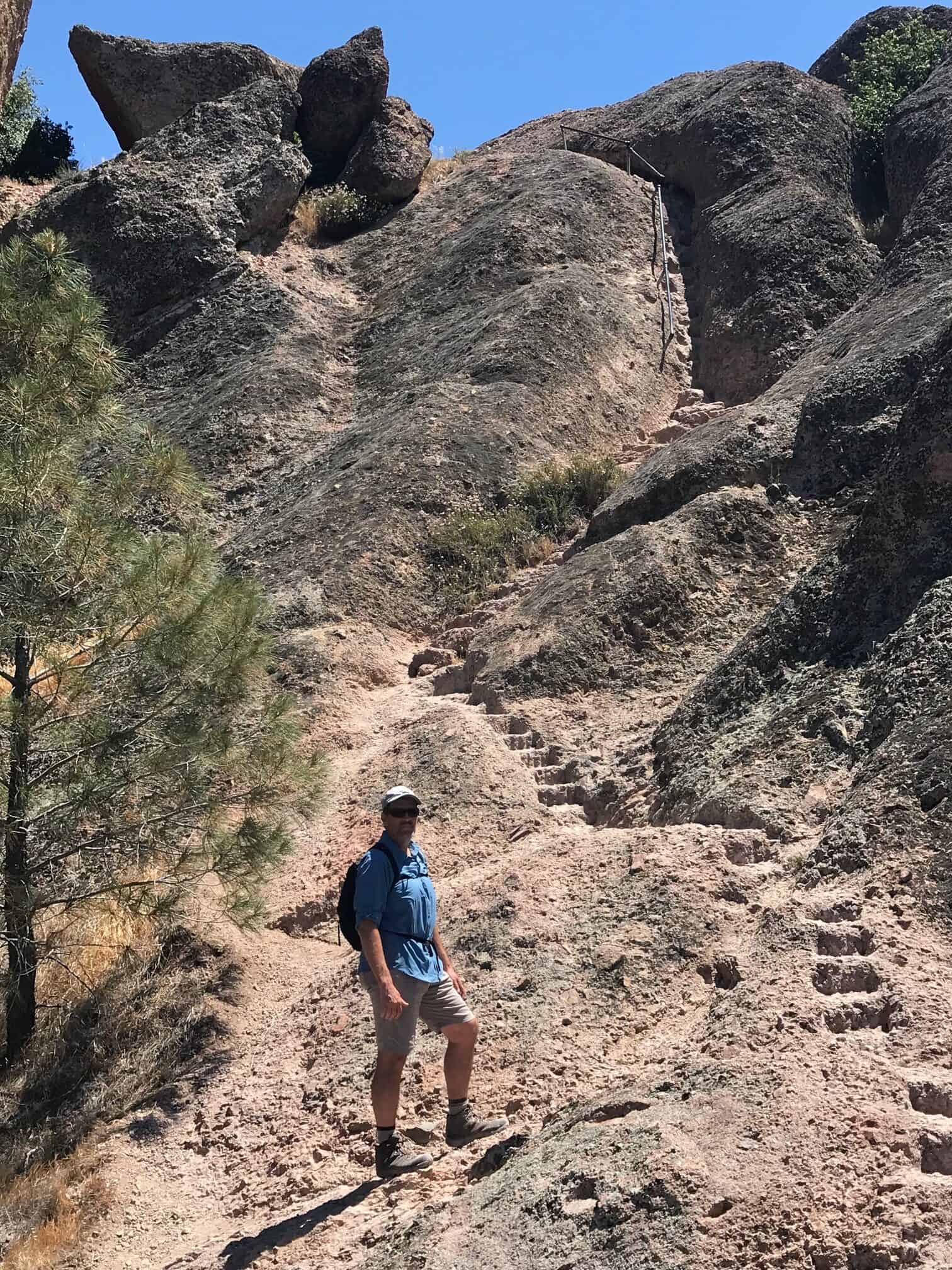 The author is ready to climb up to the High Peaks Viewpoint