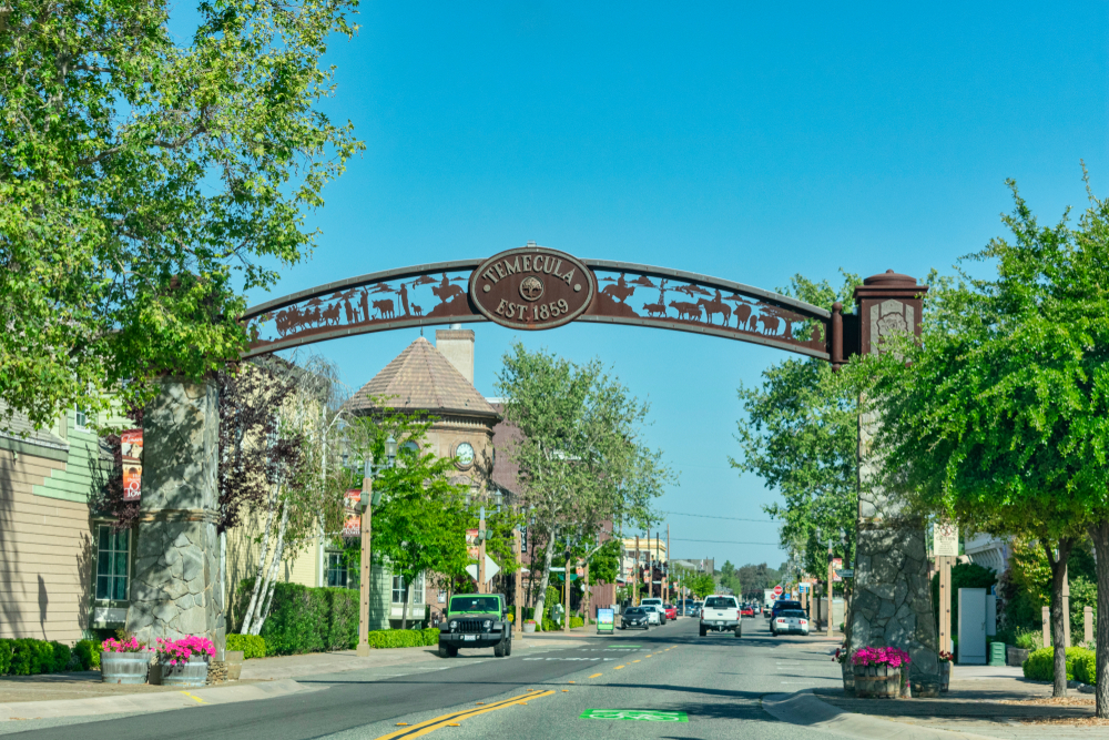The Old Town Temecula gateway depicts themes from western history and welcomes visitors to Temecula Valley Wine Country. (photo:  Michael Vi)