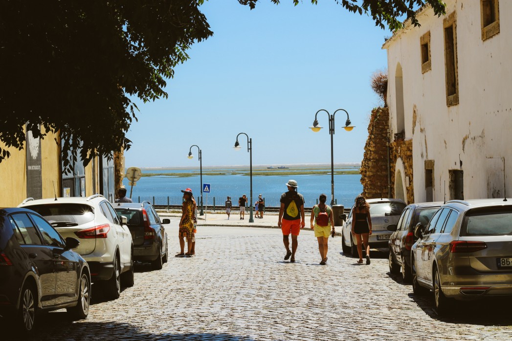 People walking in Faro, Portugal