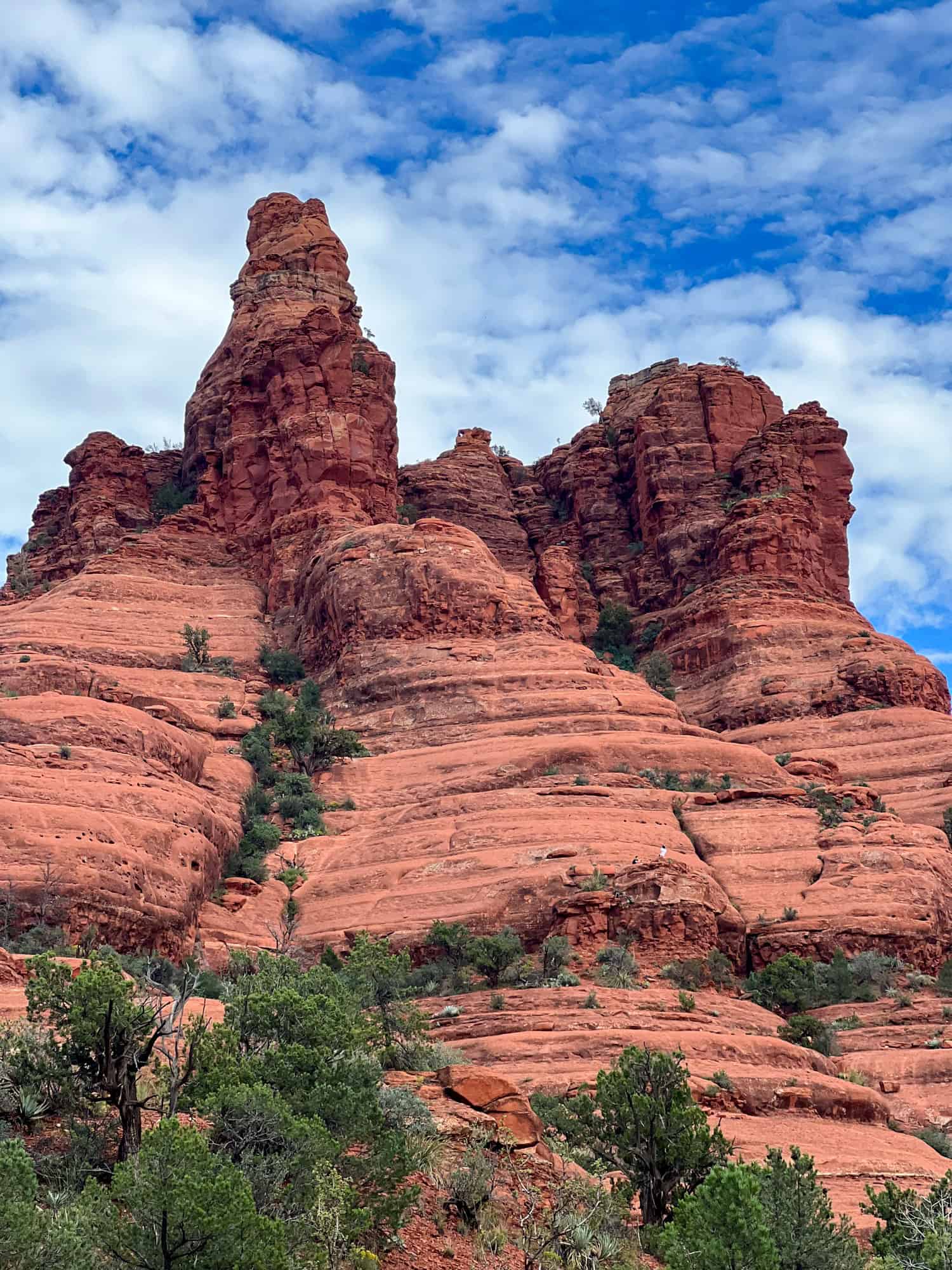 A couple takes a photo midway up Bell Rock