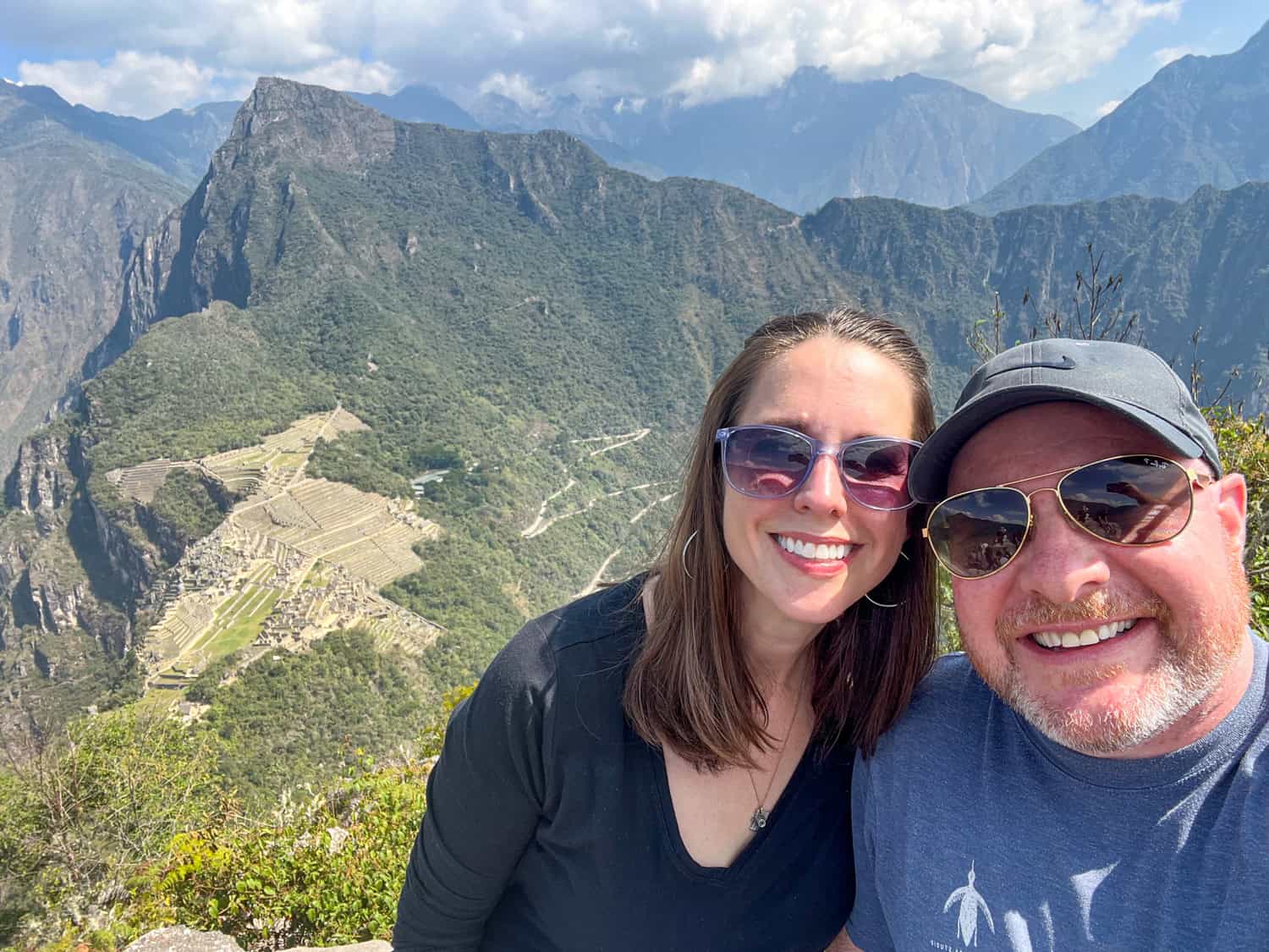 Selfie atop Huayna Picchu with Machu Picchu in the background