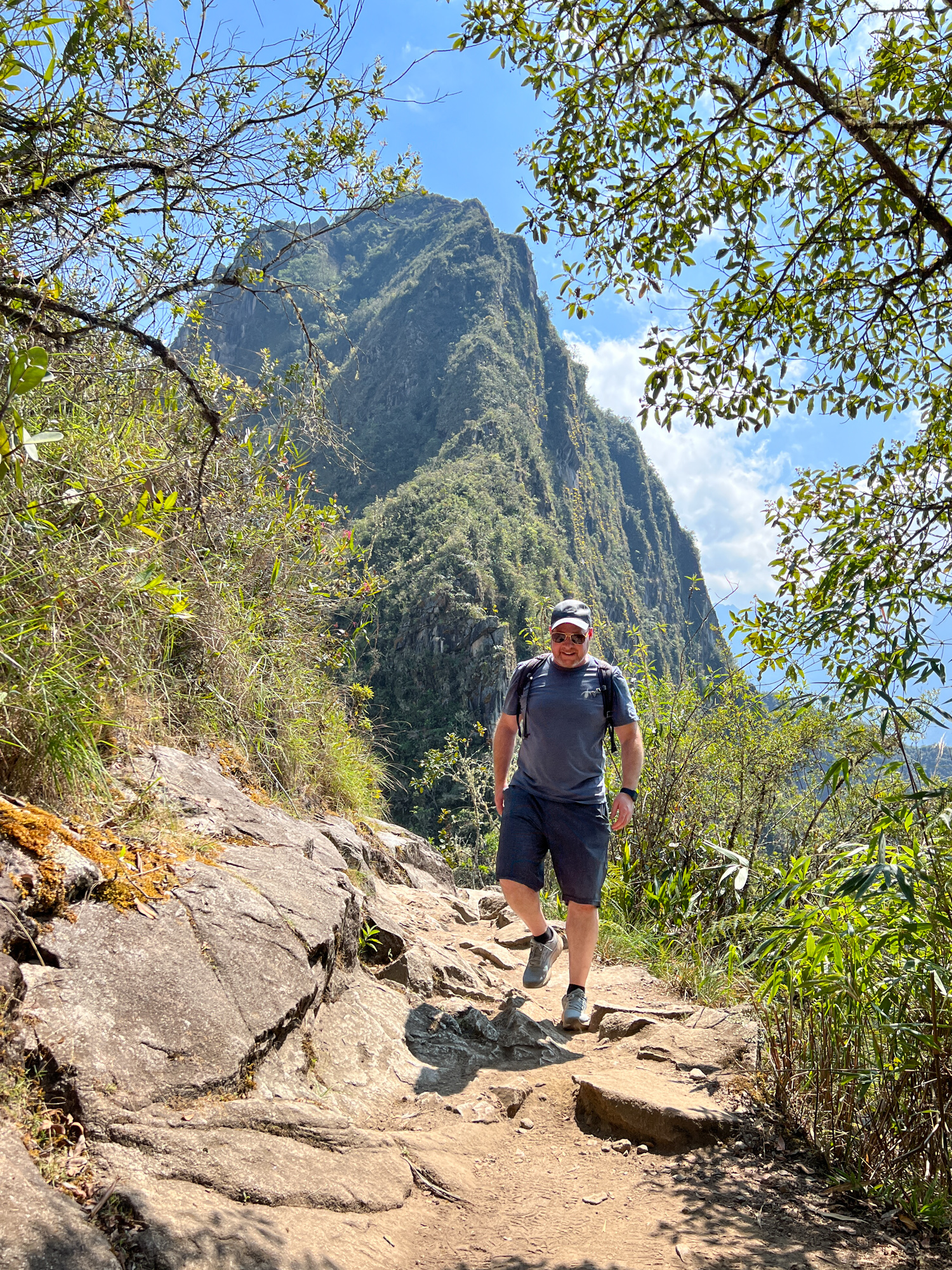 Dave hiking in Machu Picchu with Huayna Picchu in the background. His third visit was a top travel experience in 2022. (photo by Kelly Lemons)