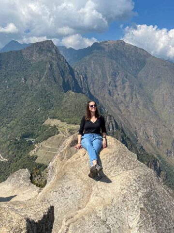 Kel seated on Huayna Picchu peak.