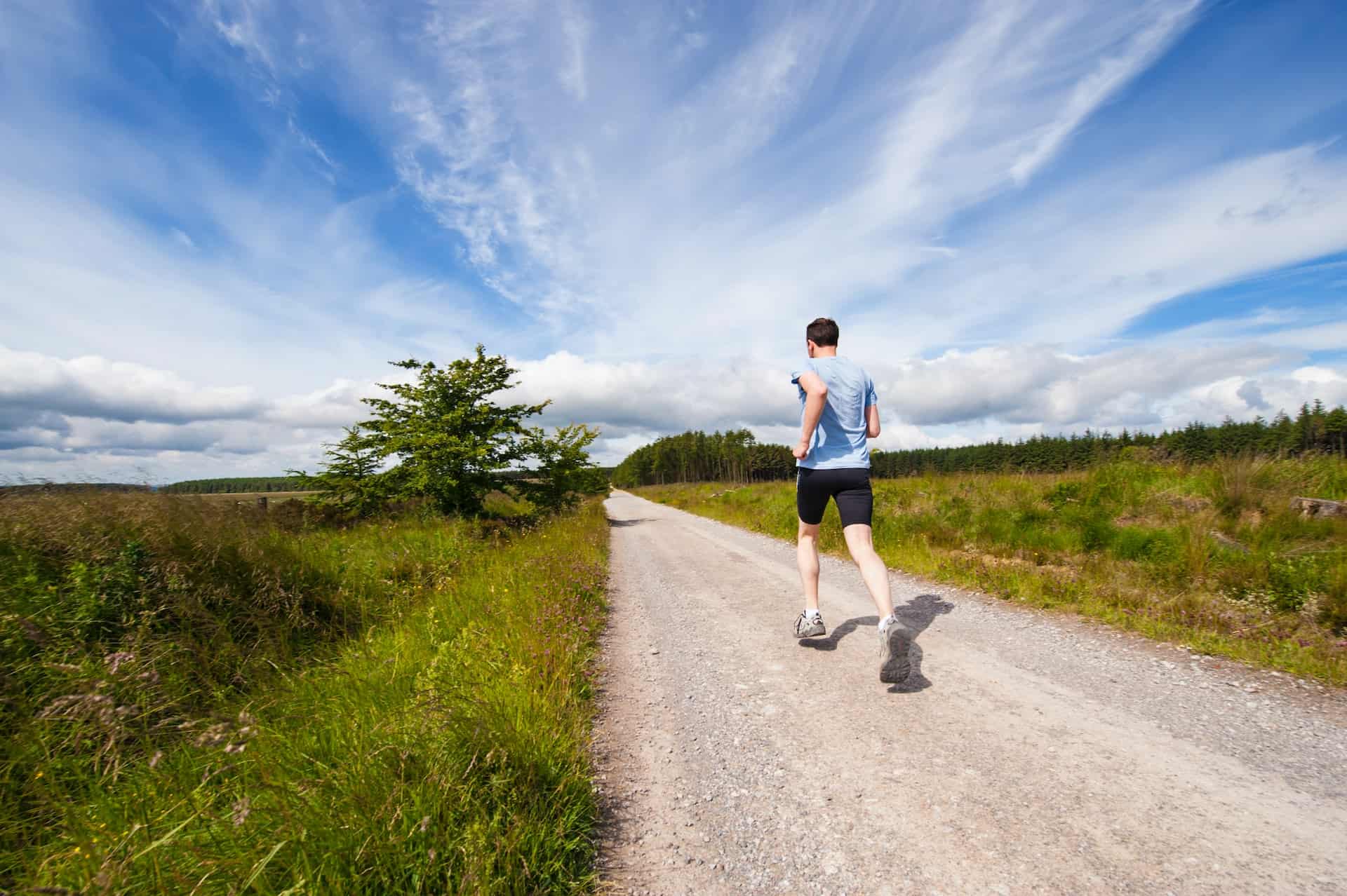 Man running to maintain his fitness routine while traveling (photo: Jenny Hill)