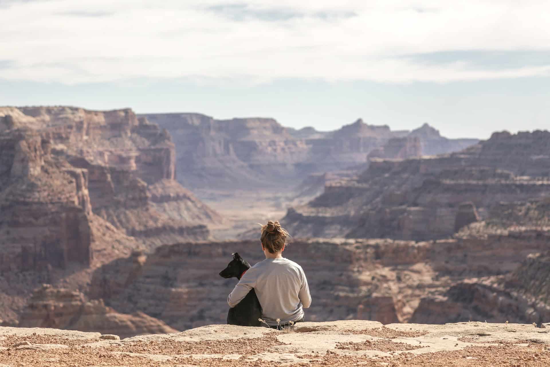 Hiker with her dog in Utah (photo: Patrick Hendry)