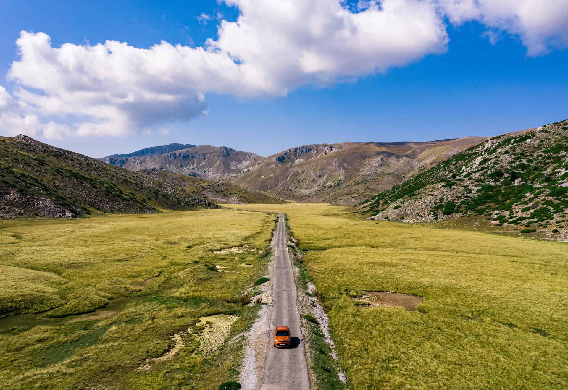 A car driving on the open road in Galicnik, North Macedonia (photo: Ervo Rocks)