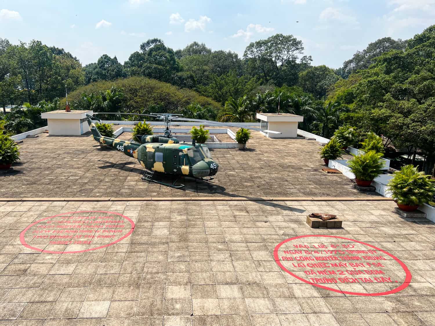 U.S. helicopter on the roof of the War Remnants Museum. The red circles are the spots where bombs were dropped during the Vietnam War.