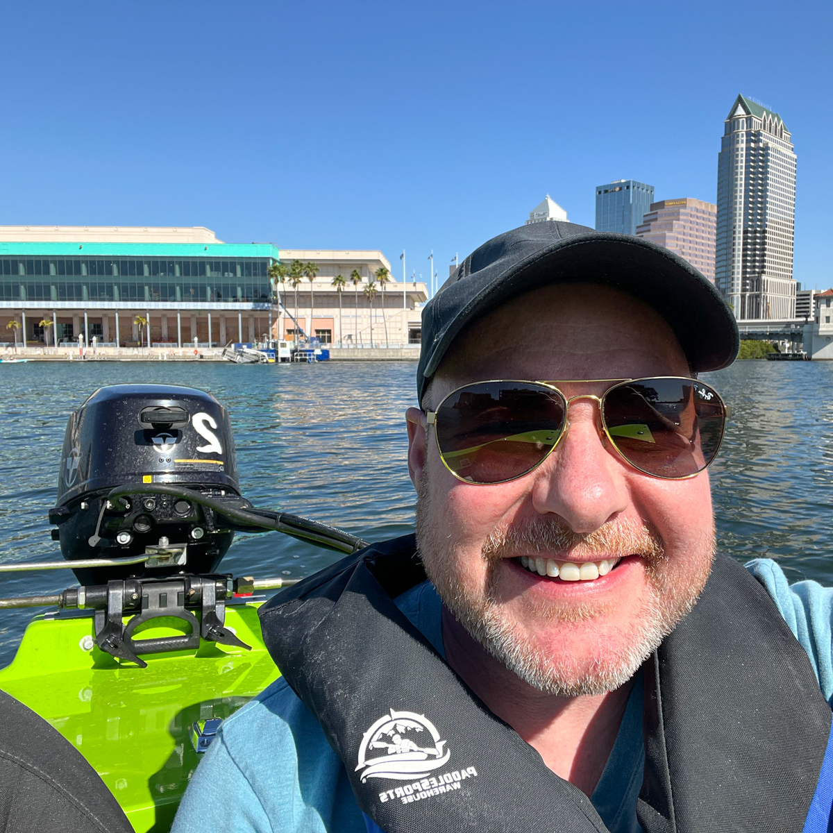 Dave driving a motorboat in Tampa Bay, Florida