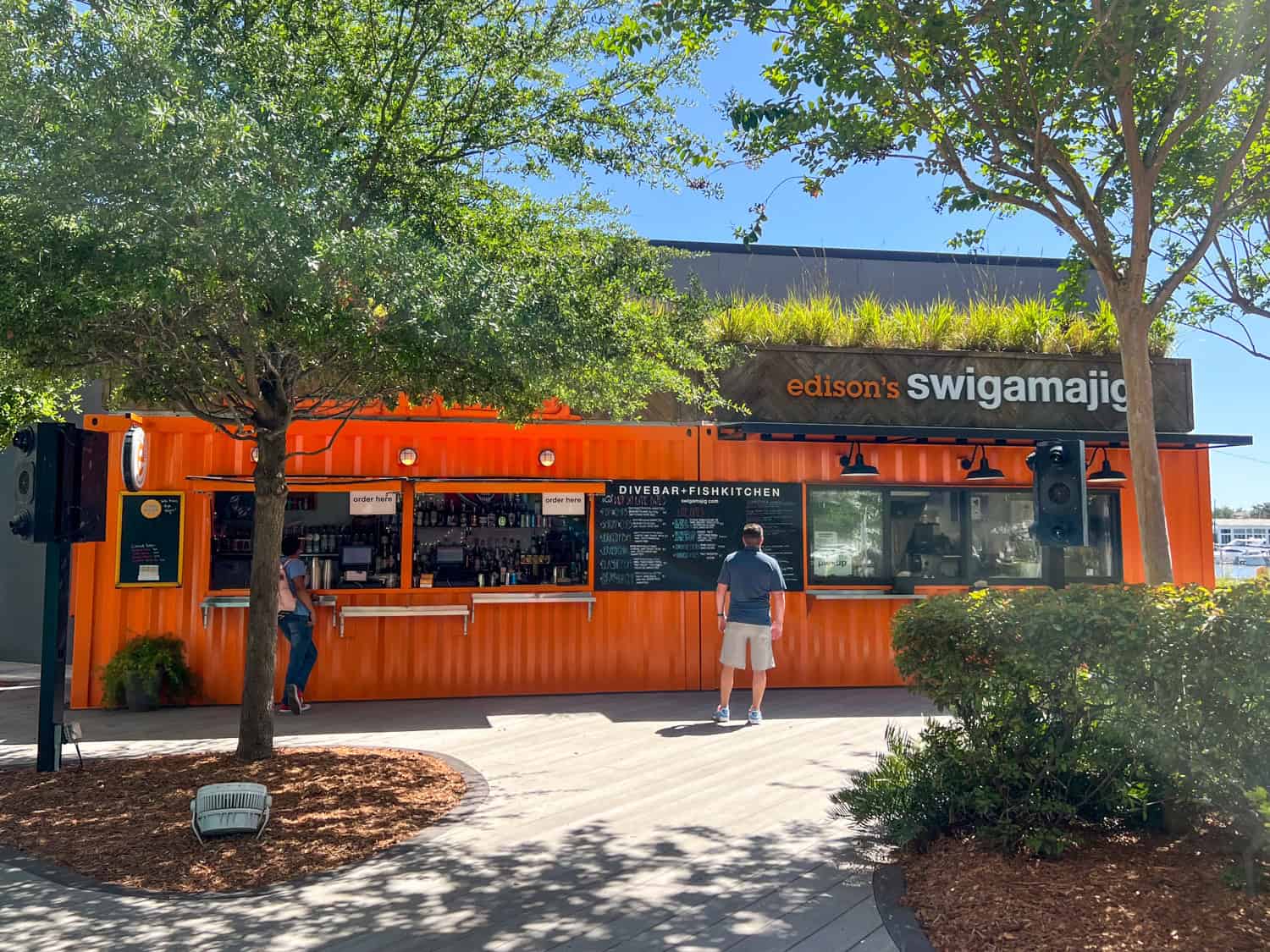 Edison's Swigamajig sells seafood out of a repurposed shipping container at Sparkman Wharf in Tampa