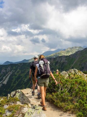 Safety tips for hikers include traveling with a buddy, such as this pair of backpackers in the Tatra Mountains in Europe (photo: Hennadii Hryshyn).