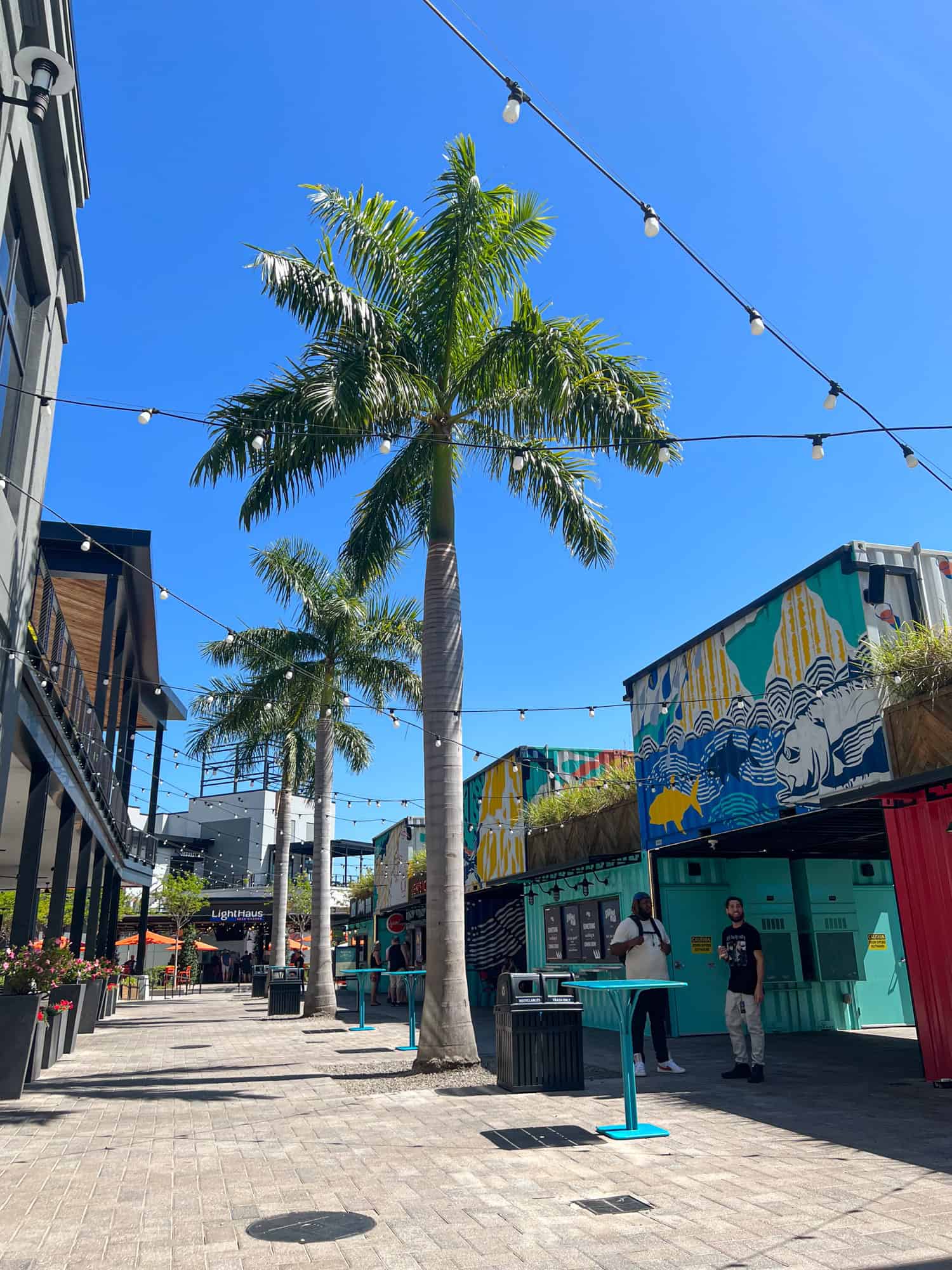 Repurposed shipping containers at Sparkman Wharf, an outdoor food market along the Tampa Riverwalk