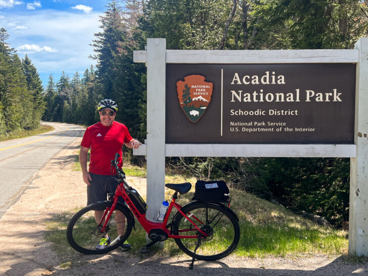 Dave with e-bike at entrance to the Schoodic Peninsula in Acadia National Park