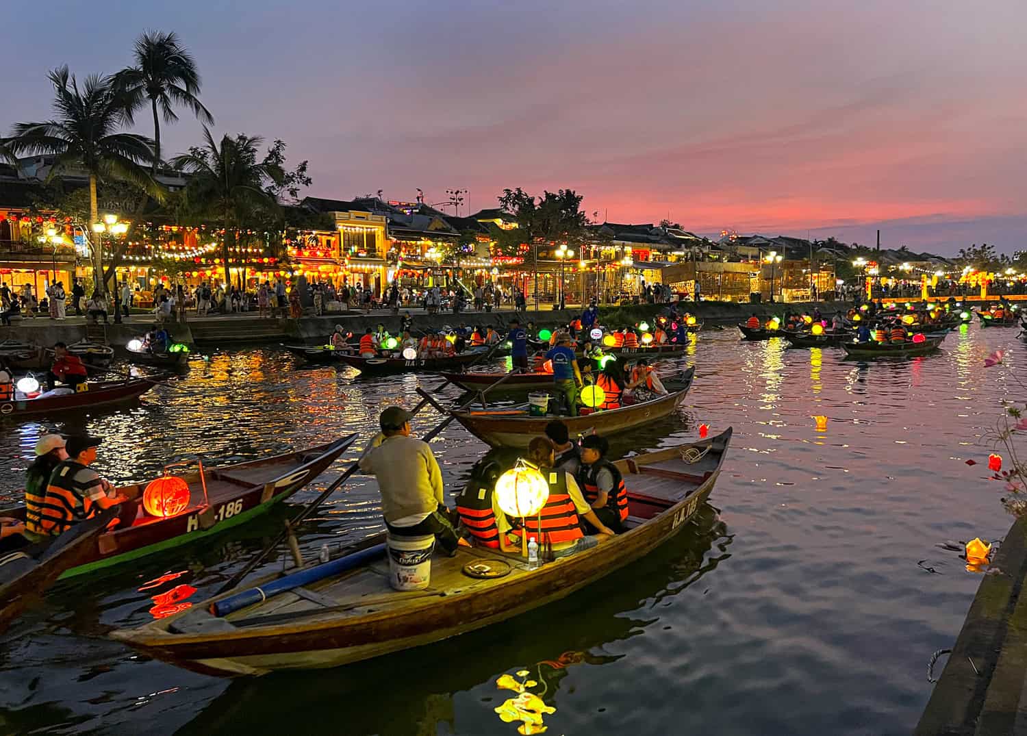 Sunset boat rides on the Thu Bon River in Hoi An, Vietnam