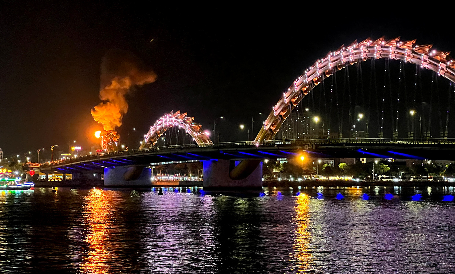 The Dragon Bridge in Da Nang breathing fire on a Sunday night.