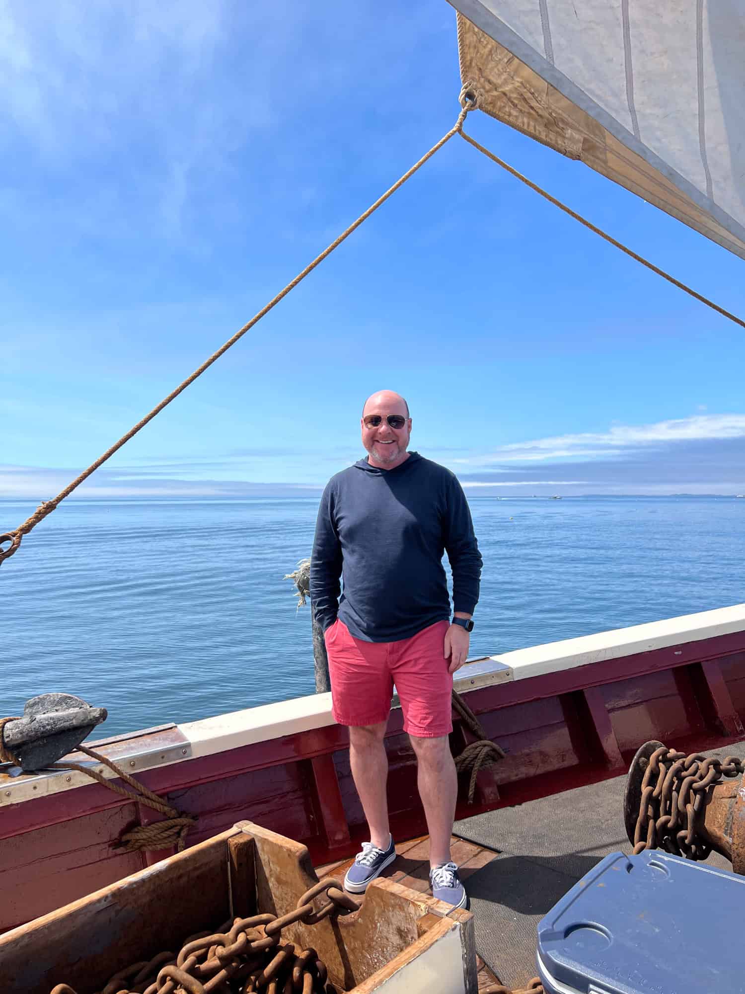 Dave is all smiles on a sunny day sailing Penobscot Bay off the coast of Maine.