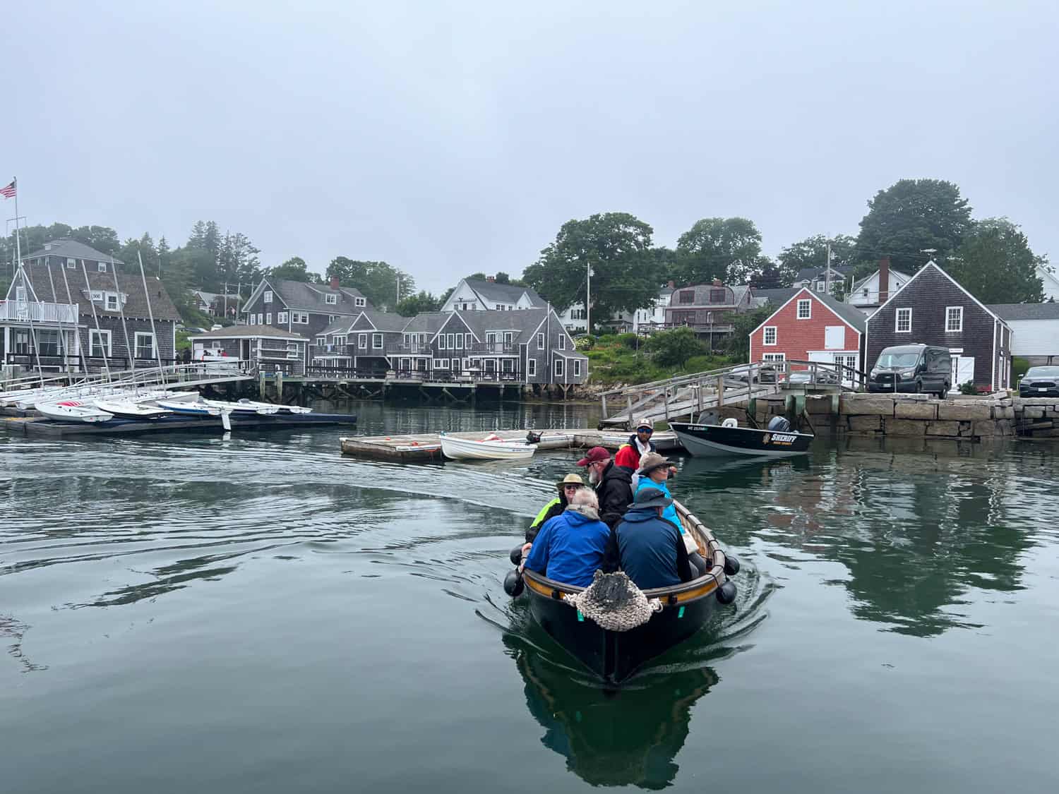 Captain Justin transports guests from the Schooner J & E Riggin to North Haven island using their yawl boat.