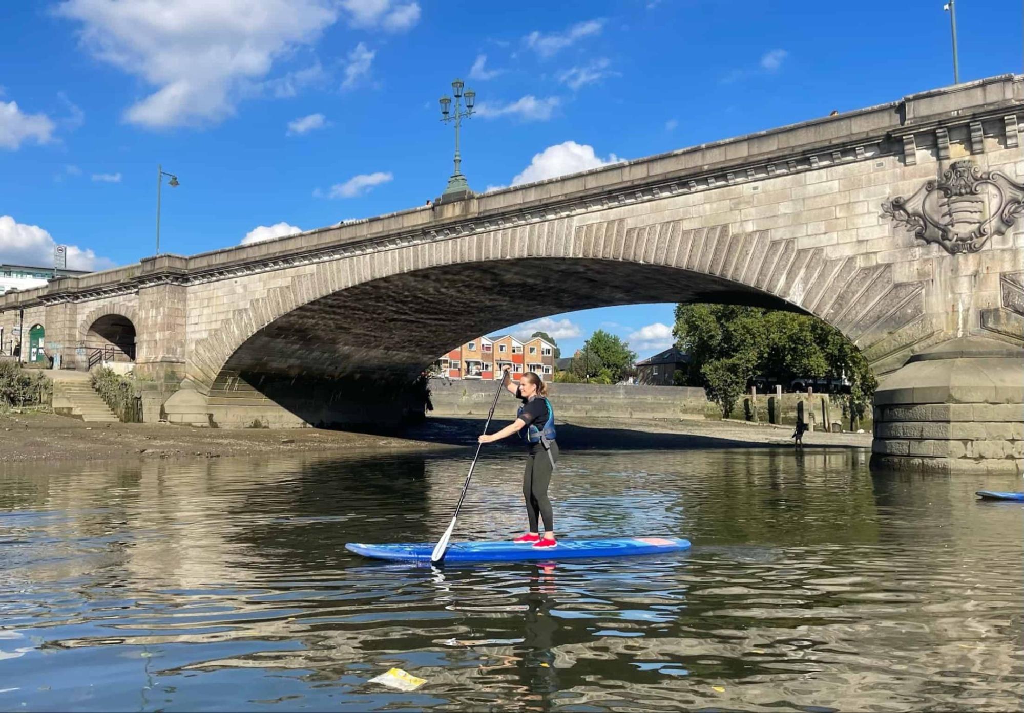 Paddleboarder at Kew Bridge (photo courtesy of Active 360)