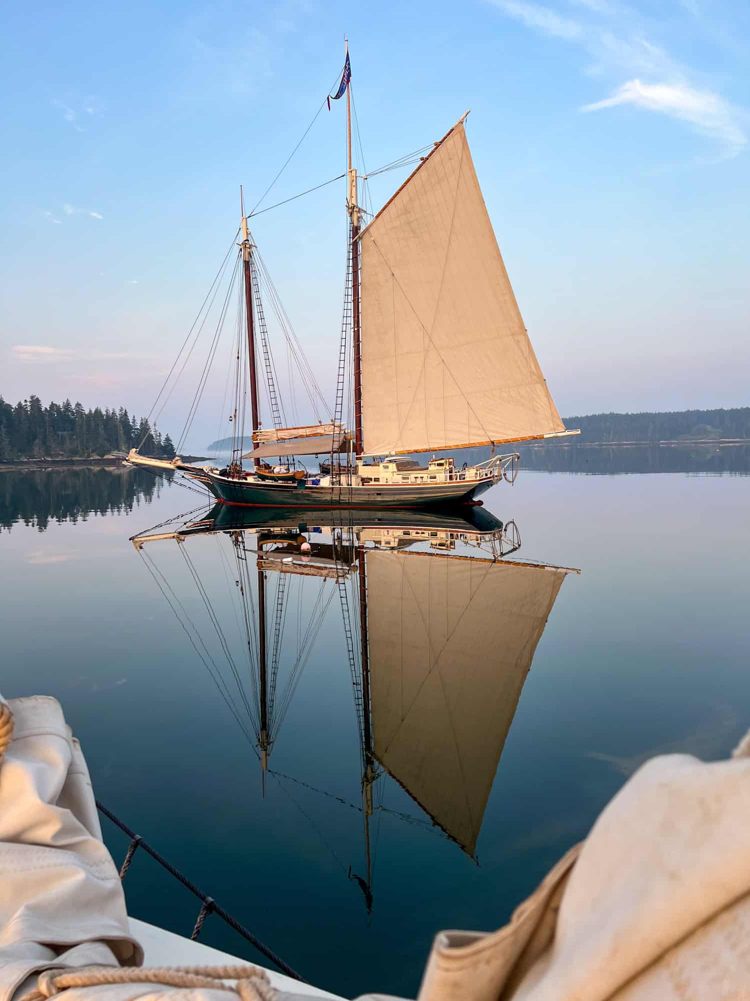 Schooner Stephen Taber reflected in the calm water