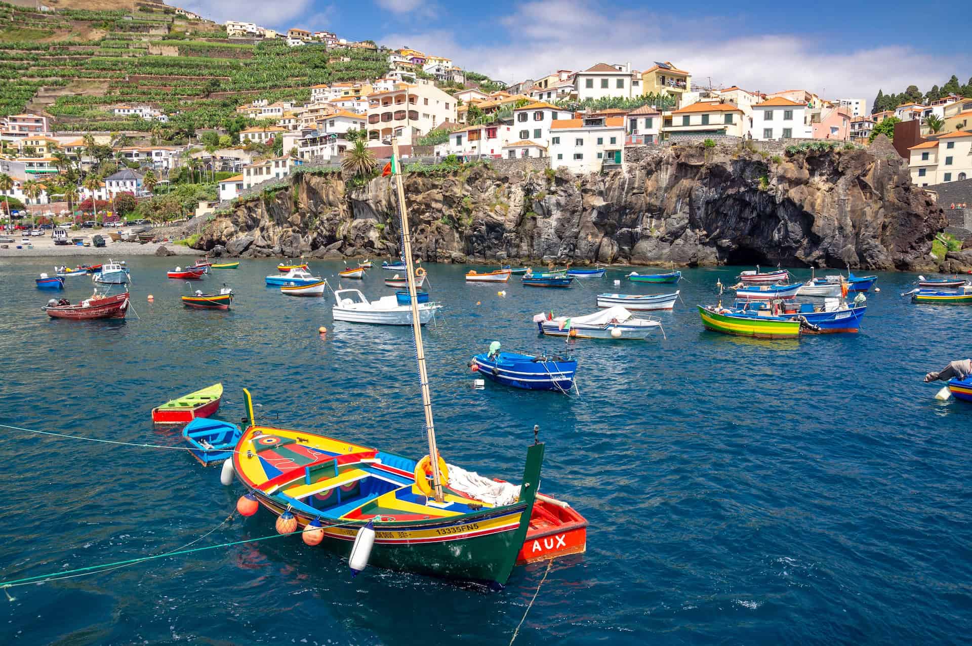 Boats bob in the water off the coast of Camara de Lobos - Madeira, Portugal (photo: Piotr Musiol)